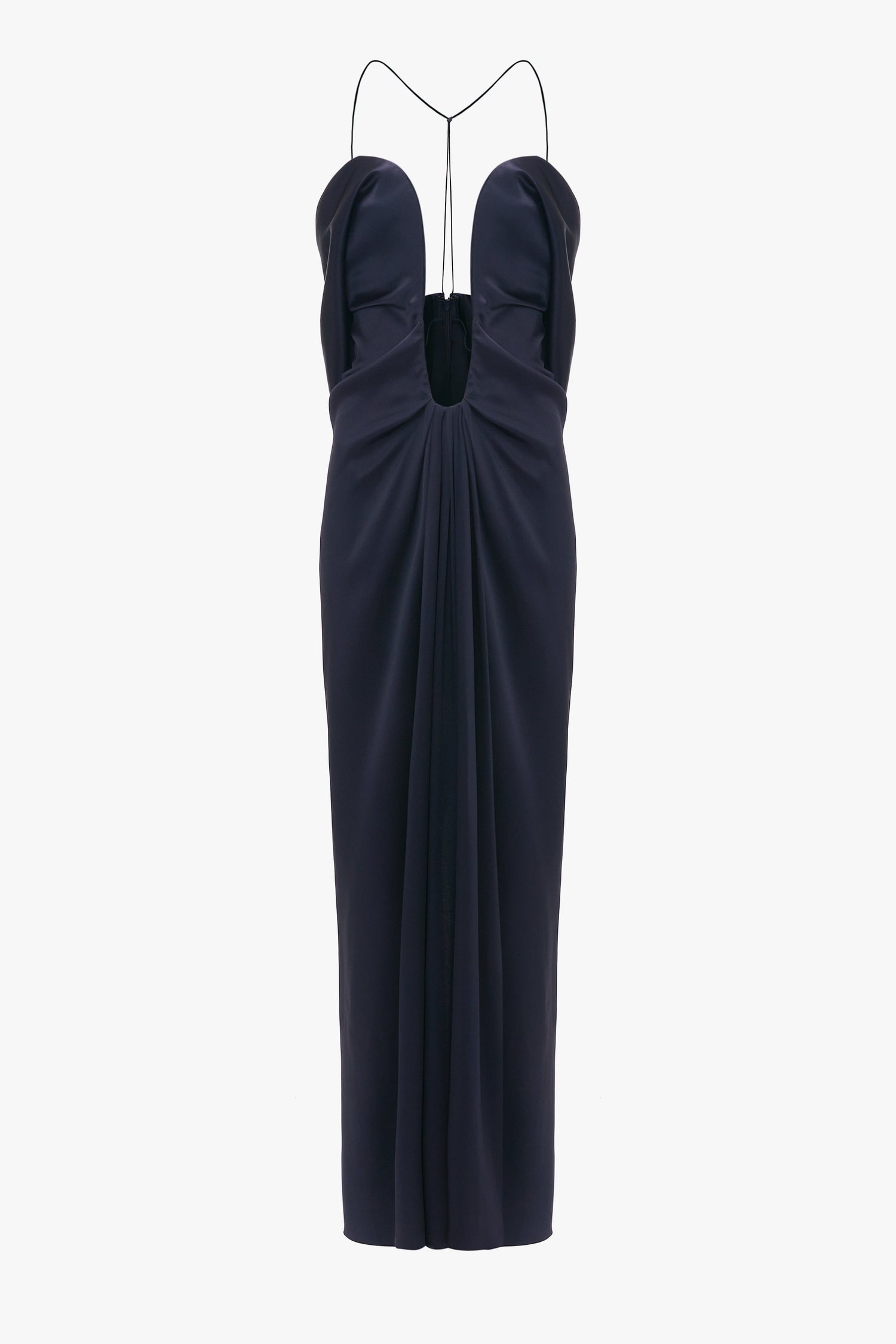 Navy blue evening gown with a sweetheart neckline and Victoria Beckham Frame Detail Cut-Out Cami Dress straps, featuring a cinched waist and draped skirt.