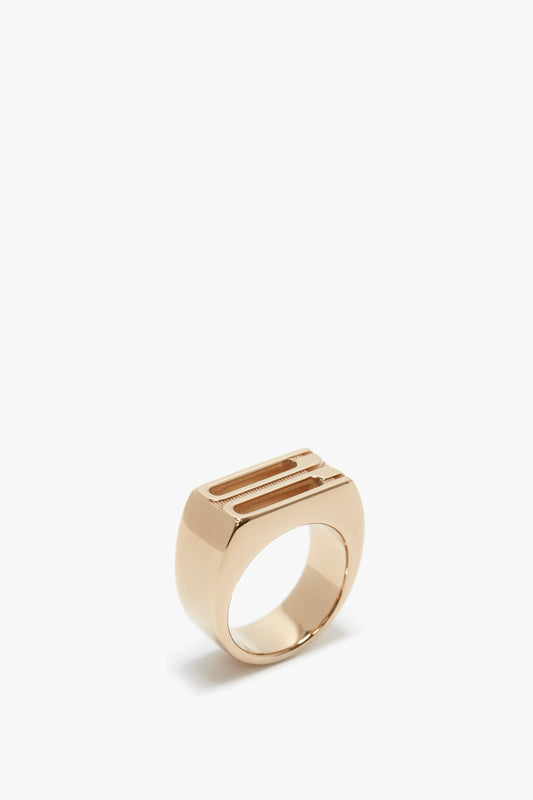 Victoria Beckham Exclusive Frame Signet Ring In Gold on a white background.