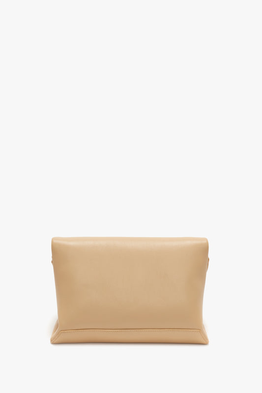 Victoria Beckham's Chain Pouch With Strap In Sesame Leather on a white background.