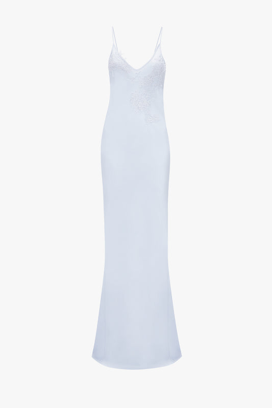 Pale blue, sleeveless Exclusive Lace Detail Floor-Length Cami Dress In Ice by Victoria Beckham displayed against a white background.