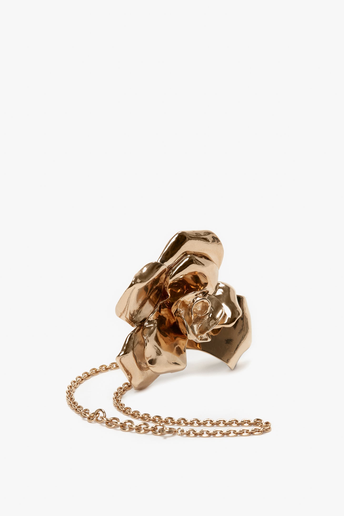 Exclusive Flower Bracelet in Gold by Victoria Beckham, isolated on a white background.