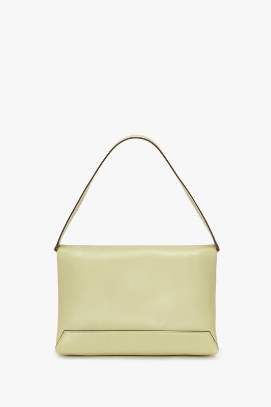 An elegant Victoria Beckham Avocado Leather Chain Pouch With Strap, with a smooth finish and gold chain detail, displayed against a white background.