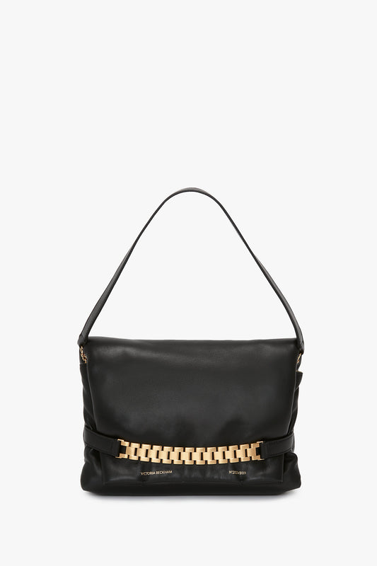 Black nappa leather Puffy Chain Pouch with Strap by Victoria Beckham, displayed against a white background.