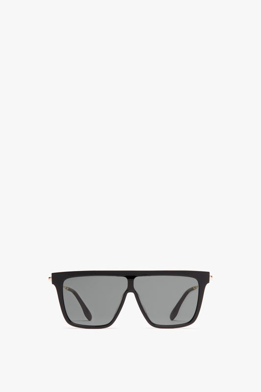 A pair of all-black Victoria Beckham Rectangular Shield Sunglasses with dark lenses, displayed against a plain white background.