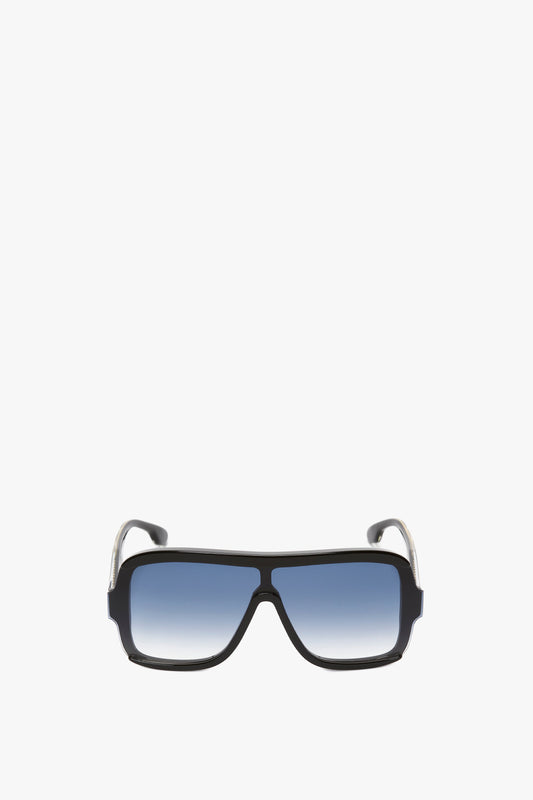 A pair of Layered Mask Sunglasses In Black Gradient by Victoria Beckham, with black rectangular lenses and a thick black frame, isolated on a white background.