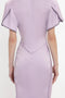 Back view of a person wearing a Gathered V-Neck Midi Dress In Petunia by Victoria Beckham with short, structured sleeves, visible seam stitching, and waist-defining pleat details.