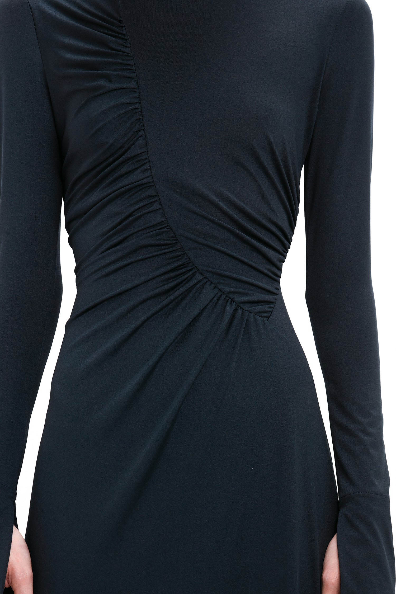 Close-up of a Victoria Beckham Ruched Detail Floor-Length Gown In Midnight with long sleeves and a gathered, ruched detail running diagonally across the torso from shoulder to opposite hip, exuding understated glamour.