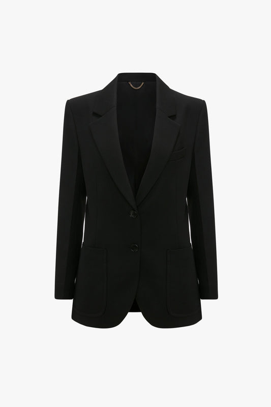 A Patch Pocket Jacket In Black by Victoria Beckham with a tailored fit, featuring notch lapels and two front patch pockets, displayed on a white background.