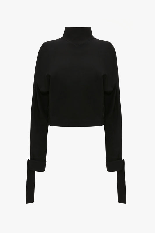 Tie Sleeve Ponti Top In Black by Victoria Beckham with a high neckline and extended cuffs on a white background, perfect for off-duty dressing.