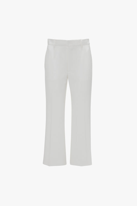 A pair of Exclusive Cropped Tuxedo Trousers In Ivory by Victoria Beckham with belt loops and a flat front, displayed against a white background.