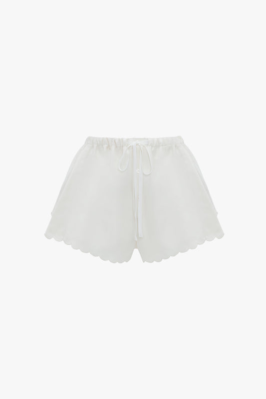 Drawstring Embroidered Mini Short In Antique White by Victoria Beckham with an elastic waistband, featuring a breathable linen-cotton blend and delicate embroidered detailing.