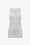 A Fine Knit Vertical Stripe Tank In White by Victoria Beckham is displayed against a plain background.