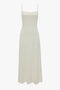 A Victoria Beckham Exclusive Panelled Midi Cami Dress In Vanilla displayed against a white background.