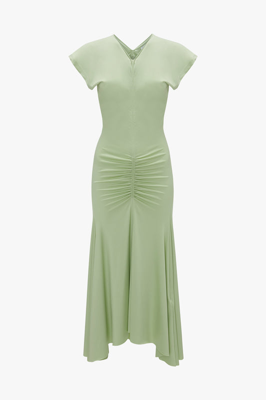 Elegant Sleeveless Rouched Jersey Dress in Pistachio with a v-neckline and white background by Victoria Beckham.