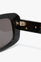 Close-up of Chain Detail Rectangular Frame Sunglasses In Black, featuring the elegant chain detail from Victoria Beckham.