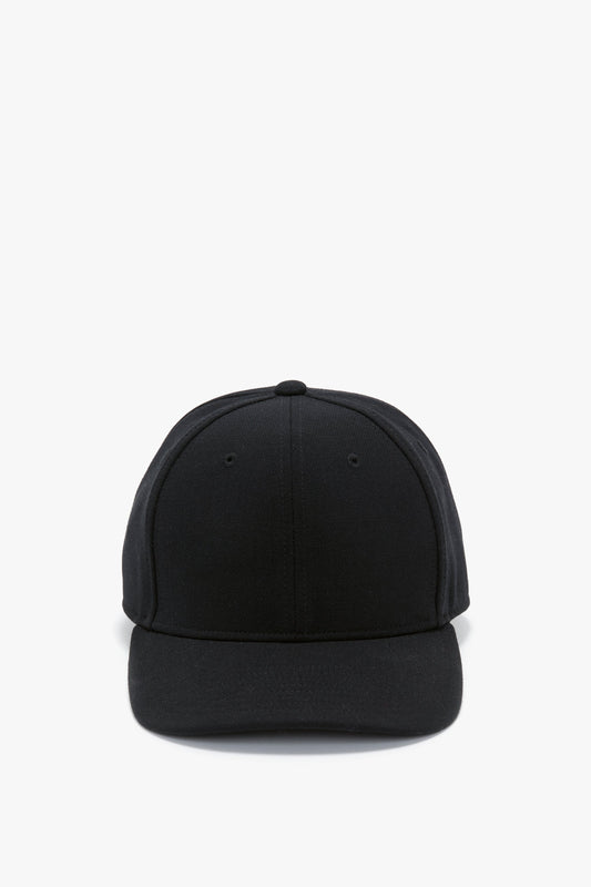 A black wool crepe Exclusive Logo Cap in Black by Victoria Beckham on a white background, viewed from the front.