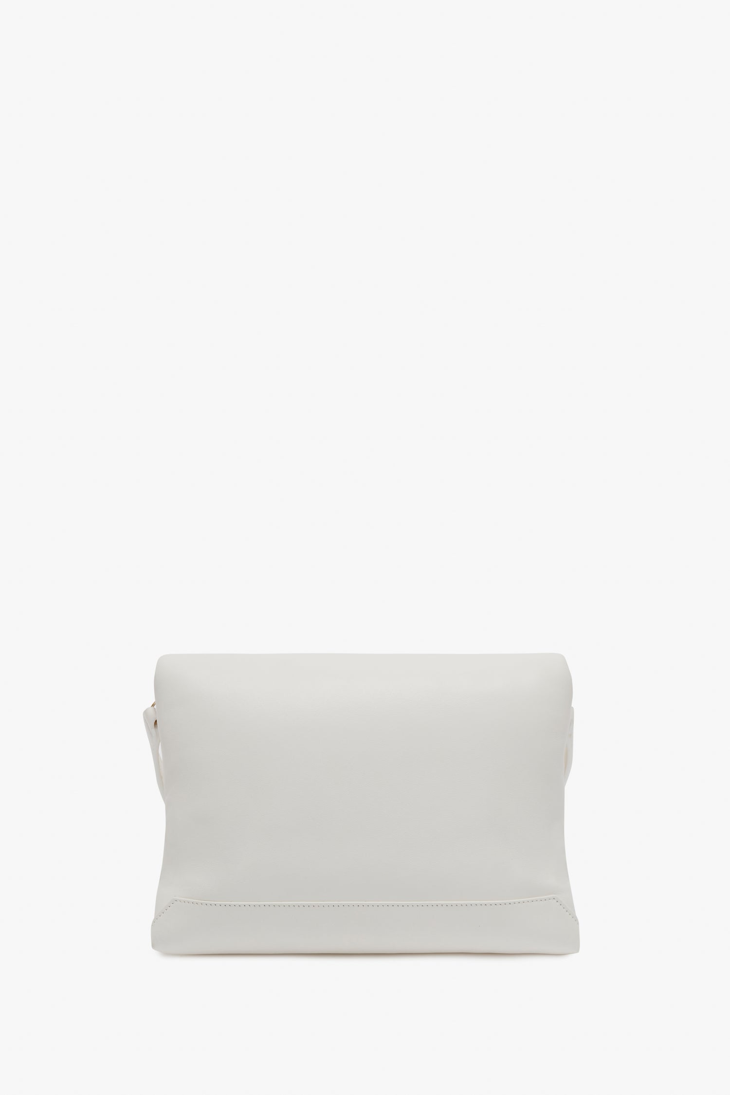 A white, rectangular Puffy Chain Pouch Bag With Strap In White Leather from Victoria Beckham is shown standing upright against a plain background, featuring a detachable shoulder strap for versatile styling.