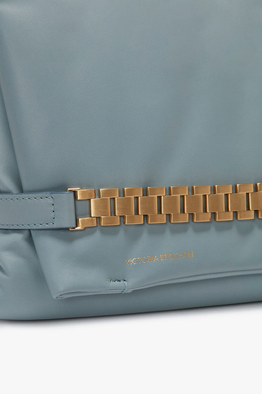 A close up of a Victoria Beckham Puffy Chain Pouch With Strap In Ice Leather handbag.