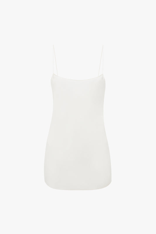 An Exclusive Cami Top In Ivory by Victoria Beckham, made from 100% silk, is displayed against a white background.