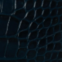 Close-up of a textured surface with a dark blue, crocodile skin pattern reminiscent of the B Pouch Bag In Croc Effect Midnight Blue Leather by Victoria Beckham.