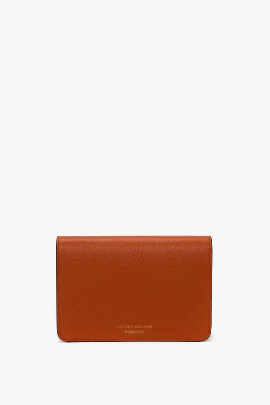 Nano Dorian Wristlet In Burnt Orange Grained Leather