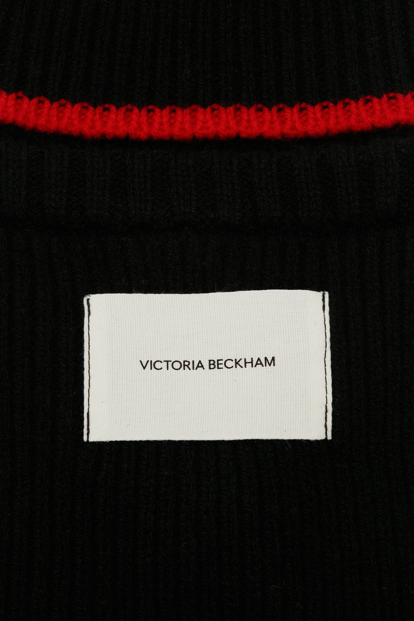 Knitted Polo Neck Bib In Black-Red