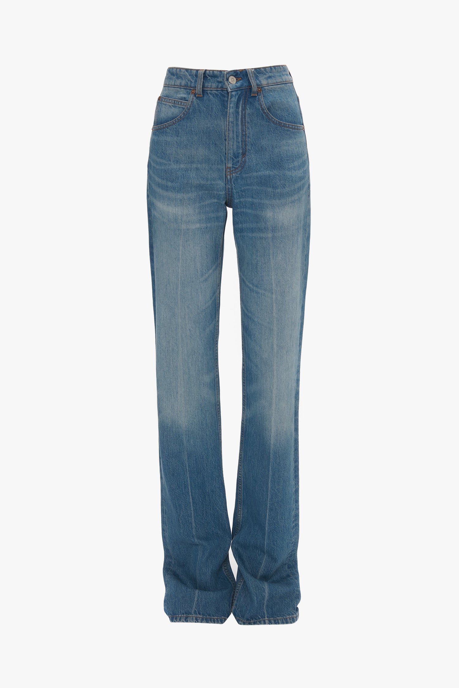 A pair of Victoria Beckham Julia Jean In Broken Vintage Wash, high-waisted, straight-leg jeans with a button and zip closure, made from 100% cotton denim, featuring front and back pockets.