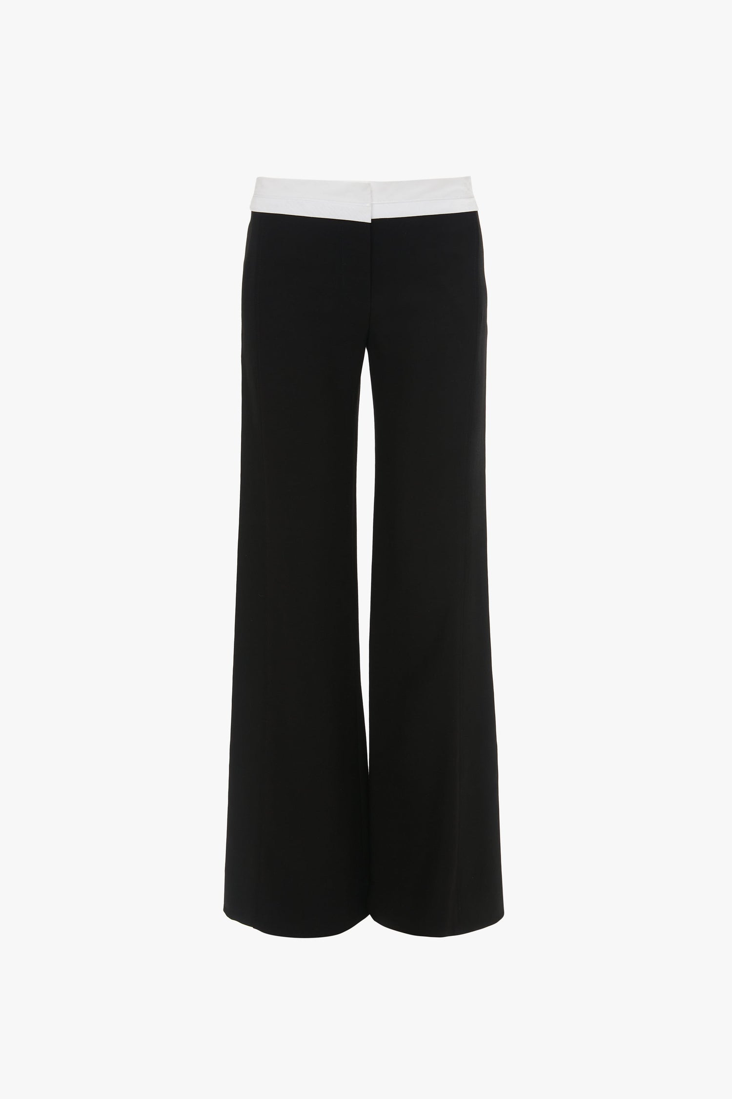 A pair of Victoria Beckham Side Panel Trouser In Black with a chic white waistband, viewed from the back.