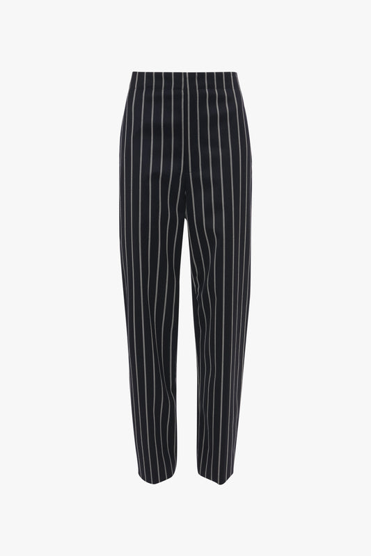 Victoria Beckham's Tapered Leg Trouser In Midnight-White, featuring a high waist and straight-leg cut for a sleek, elongated look.