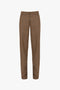 A pair of brown and black plaid Asymmetric Chino Trouser In Tobacco by Victoria Beckham with a straight-leg design and front zipper closure against a white background.