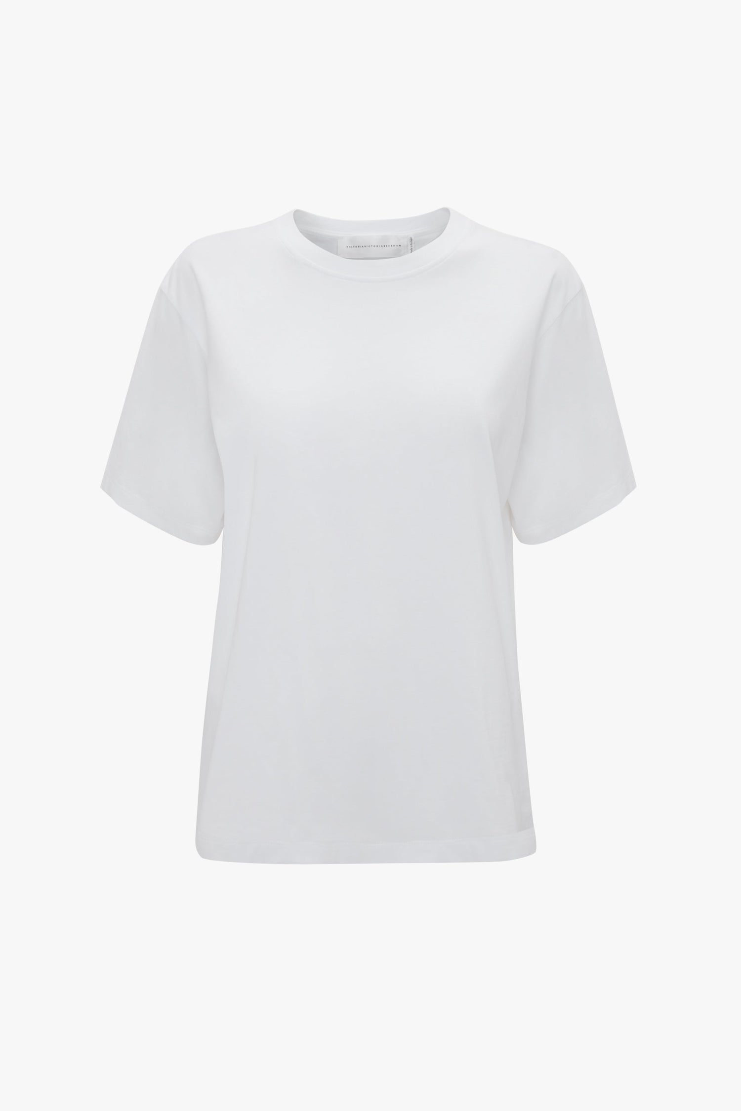 The Victoria Beckham Victoria T-Shirt In White, made from organic cotton, is a plain white short-sleeve t-shirt with a crew neck displayed against a pristine white background.