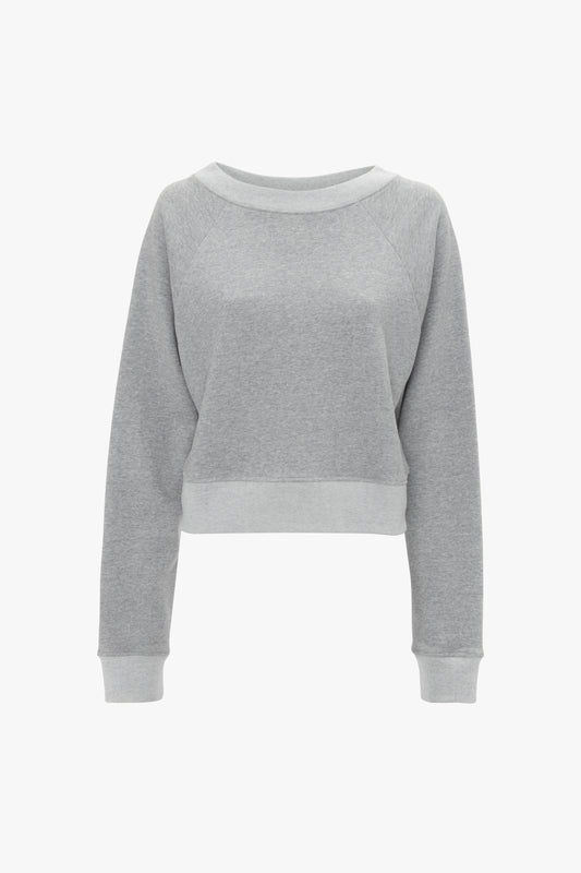Victoria Beckham Grey Marl Cropped Sweatshirt with long sleeves and a crew neckline, displayed on a white background.
