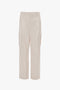 Relaxed Cargo Trouser In Bone by Victoria Beckham features a modern relaxed silhouette and multiple pockets.