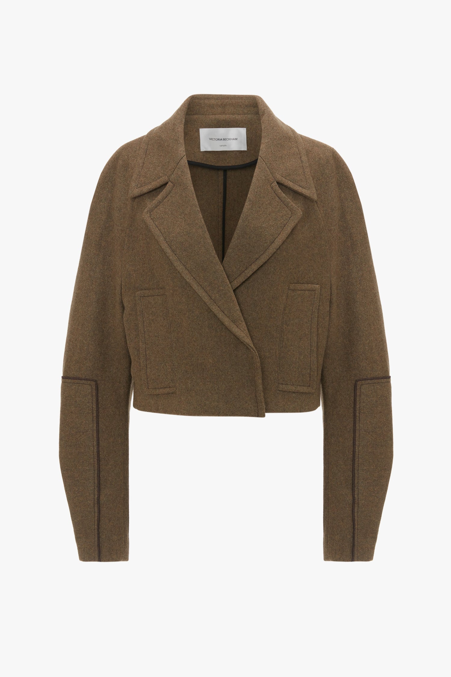 A brown, cropped peacoat crafted from merino wool with long sleeves, a wide lapel collar, and a double-breasted design featuring two front pockets has been replaced with the Victoria Beckham Cropped Pea Coat In Khaki.