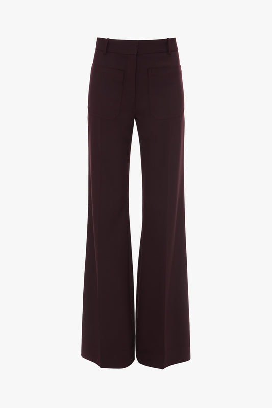 Back view of Alina Trouser In Deep Mahogany, high-waisted, wide-leg pants made from recycled wool, featuring two back pockets on a white background by Victoria Beckham.