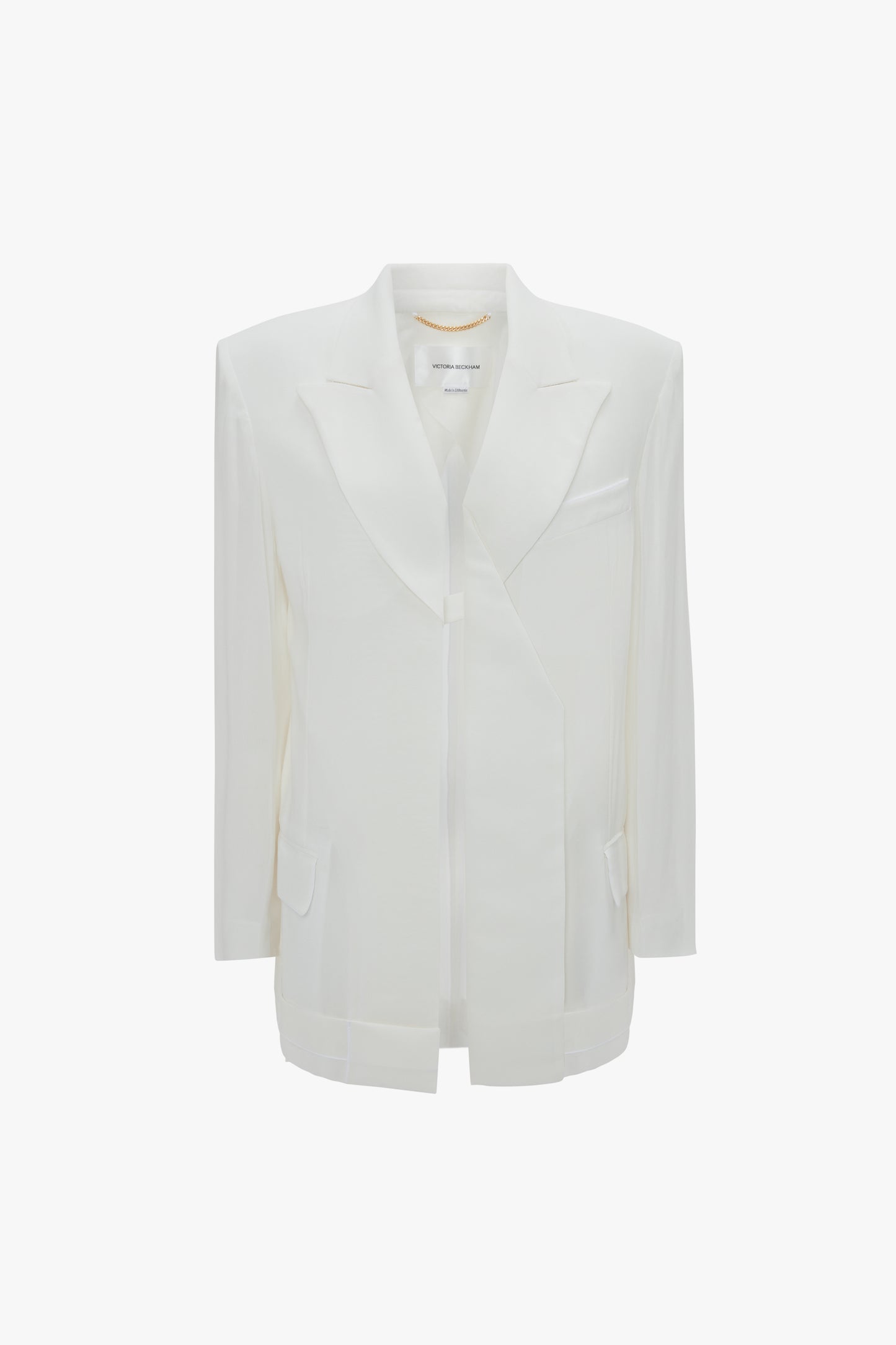 A Fold Detail Tailored Jacket In White by Victoria Beckham with fold detail and notched lapels, two front flap pockets, and a chest pocket on a white background. Crafted from featherweight wool for a modern flair.