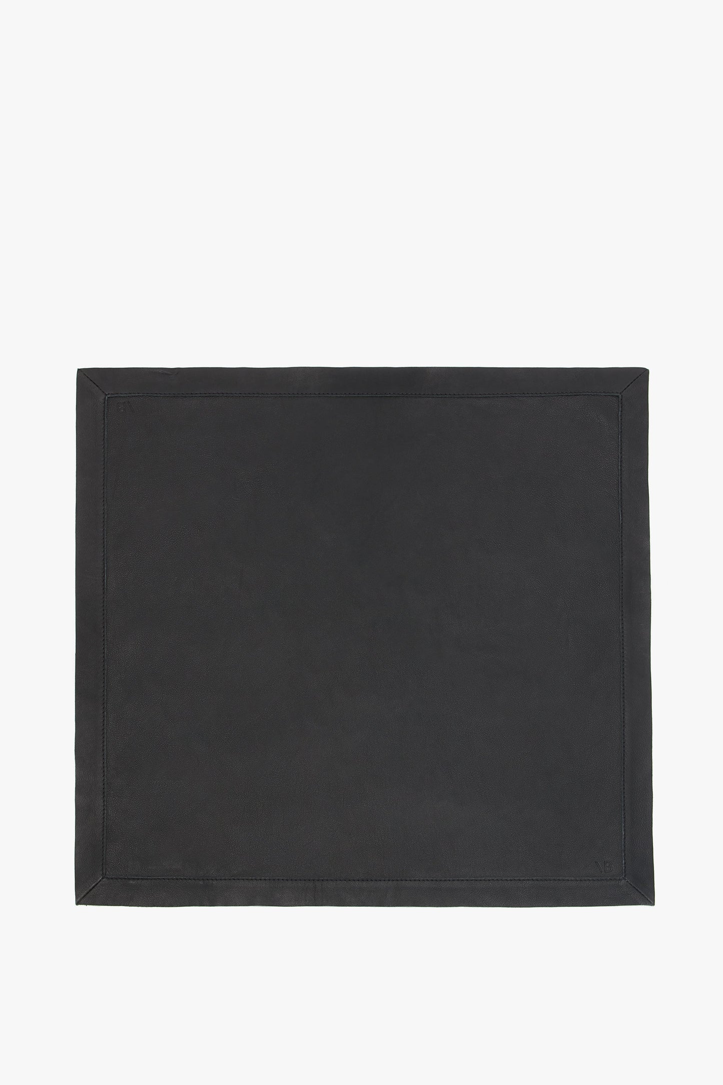 A Leather Scarf In Black by Victoria Beckham with a simple, plain design and a slightly visible border, reminiscent of supple leather.