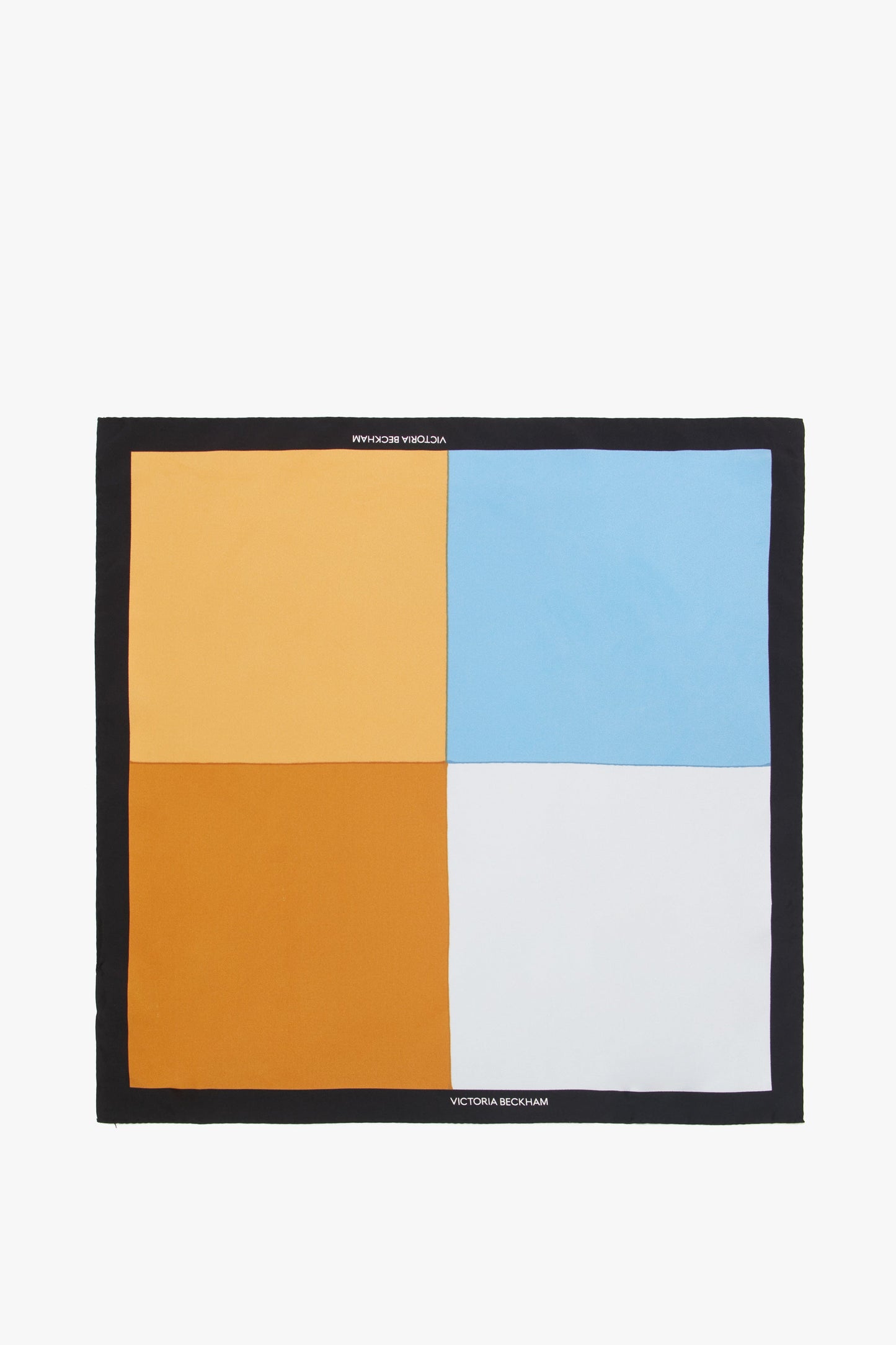 An elegant accessory, the Colour Block Silk Scarf In Marina is divided into four equal quadrants: top left tan, top right light blue, bottom left orange, and bottom right white. "Victoria Beckham" and "Colour Block Silk Scarf In Marina" adorn the edges.