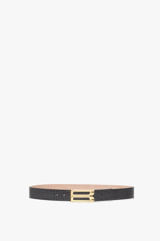 A Jumbo Frame Belt In Slate Grey Croc Embossed Calf Leather by Victoria Beckham, displayed on a white background.