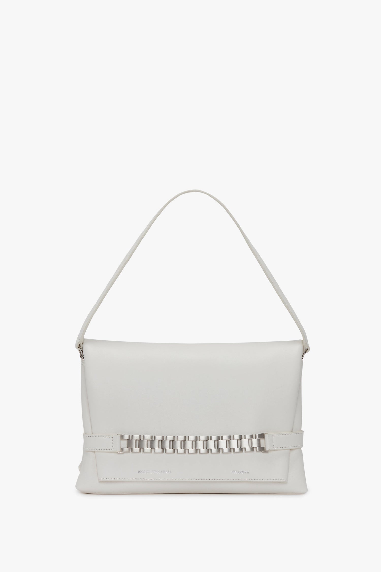 A Chain Pouch Bag with Brushed Silver Chain In White, featuring a decorative interlocking design at the center of its front flap, and adorned with silver Victoria Beckham branding.