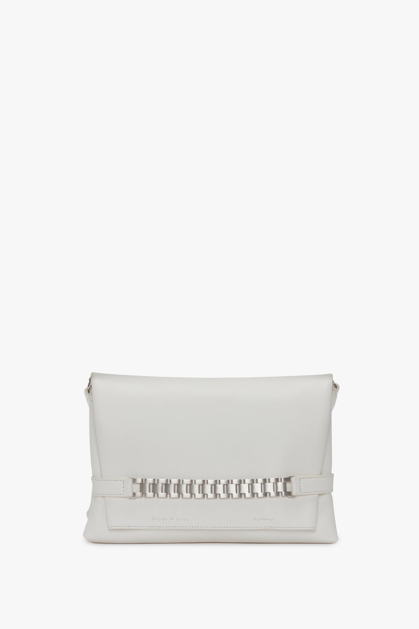 Chain Pouch Bag with Brushed Silver Chain In White by Victoria Beckham with a rectangular shape and a decorative chain link accent on the front. Features silver VB branding and a detachable strap for versatile wear.