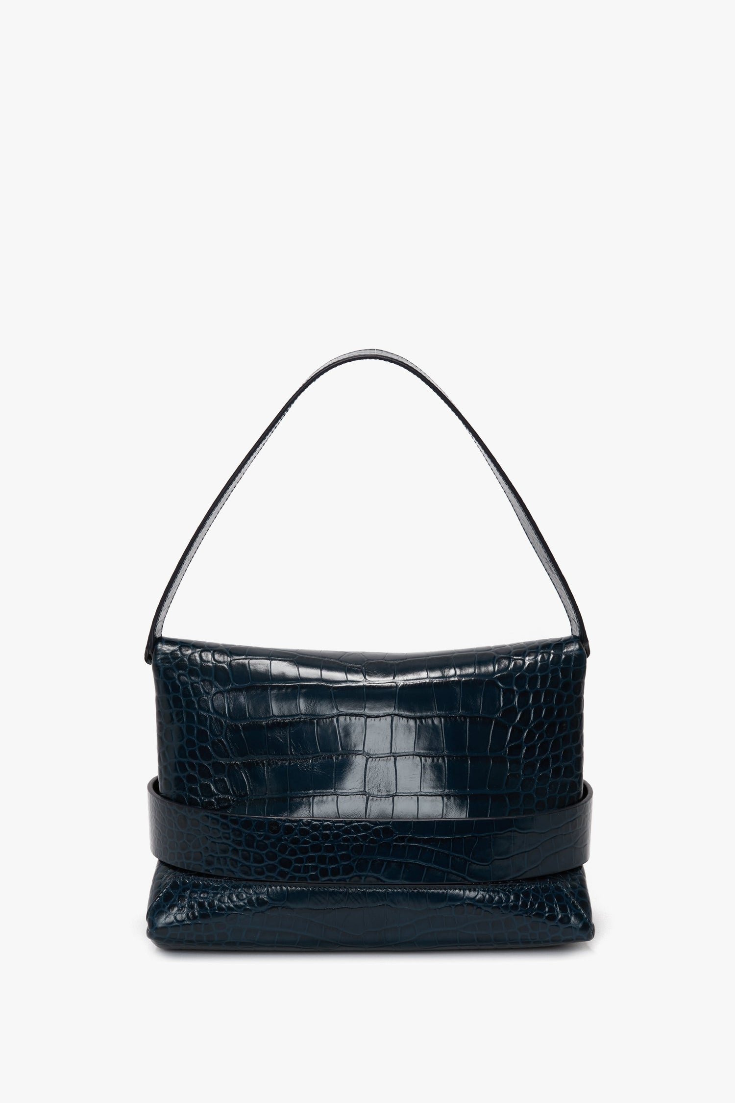 A black crocodile-patterned calf leather handbag with a single strap and a hint of Midnight Blue, displayed against a plain white background, is the B Pouch Bag In Croc Effect Midnight Blue Leather by Victoria Beckham.