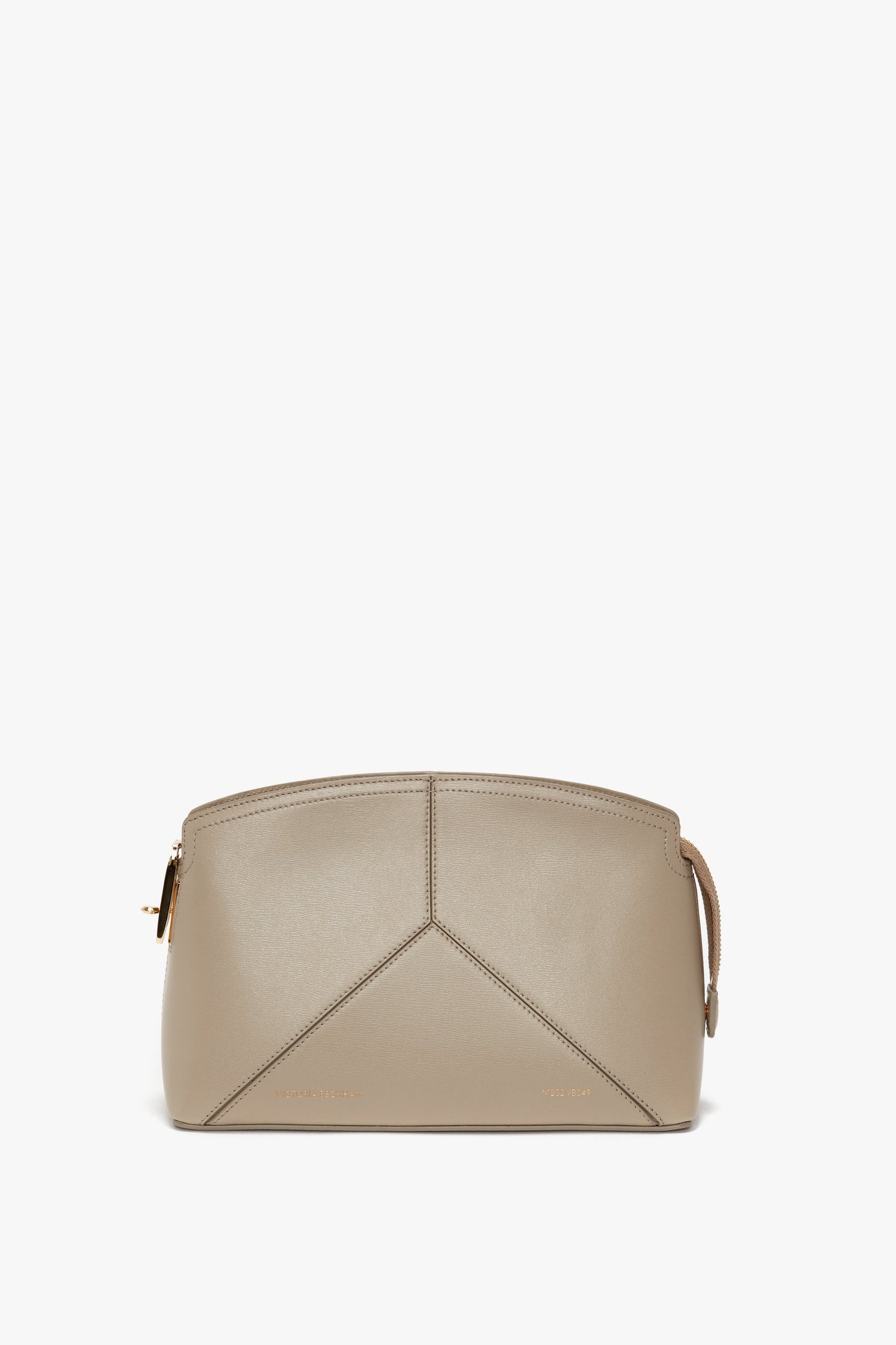 A Victoria Beckham Victoria Crossbody Bag in Taupe Leather with a minimalist, structured design, featuring subtle stitching details and a zipper closure.