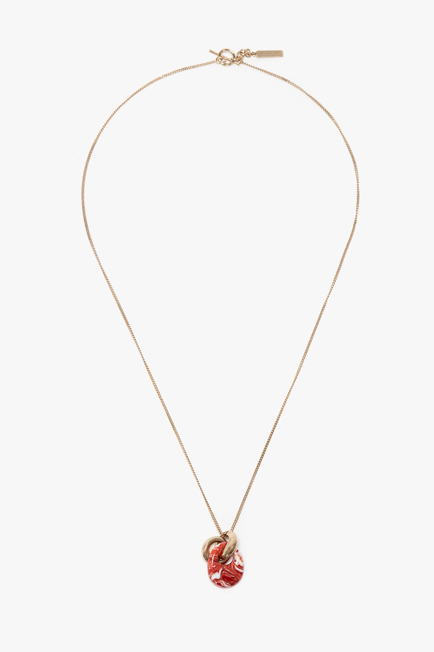 A Victoria Beckham Exclusive Resin Pendant Necklace In Light Gold-Orange, made in Italy.