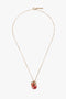 A Victoria Beckham Exclusive Resin Pendant Necklace In Light Gold-Orange, made in Italy.