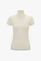 A Victoria Beckham Polo Neck Knitted T-Shirt In Cream with a subtle pointelle stitch pattern is displayed against a plain white background, perfect for trans-seasonal layering.