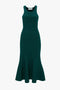 A flattering Victoria Beckham VB Body Sleeveless Dress In Lurex Green, boasting a form-fitting design and a new-season wardrobe essential with its flared hem.