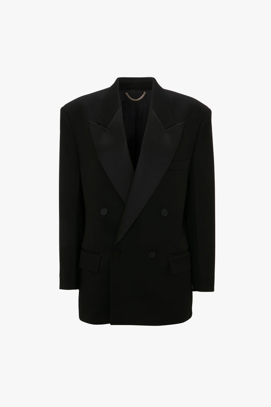 A Victoria Beckham Satin Lapel Tuxedo Jacket in Black is displayed on a white background.
