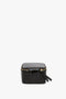 A Victoria Beckham Jewellery Box In Black Croc-Effect Leather with a crocodile pattern, gold zipper, and black zipper pull tab.