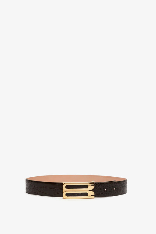 A Jumbo Frame Belt In Chocolate Croc-Effect Leather from Victoria Beckham, perfect for contemporary styling, displayed on a plain white background.